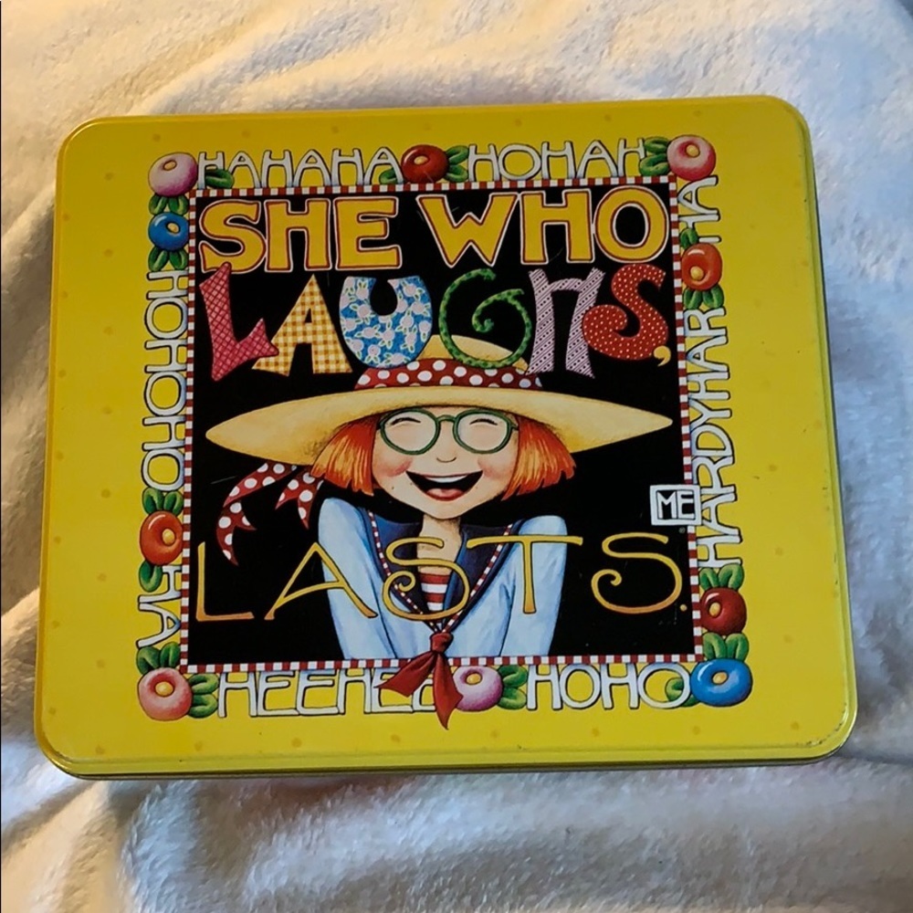 Vintage Mary Engelbreit “She Who Laughs Lasts” Tin